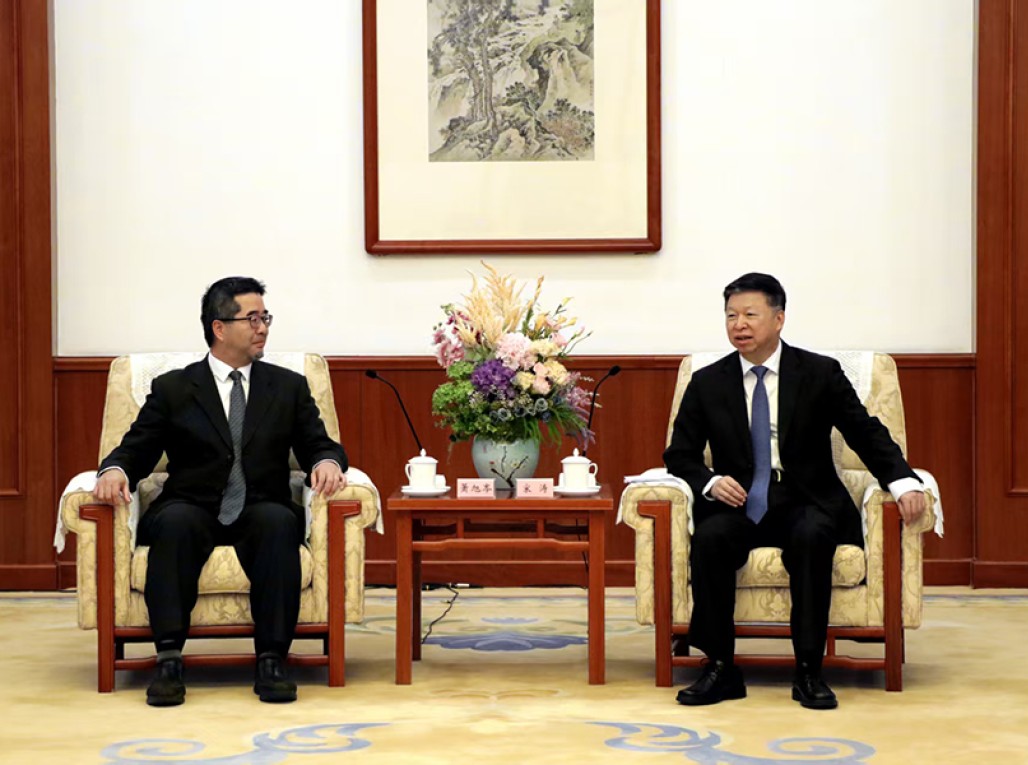 宋涛会见萧旭岑一行