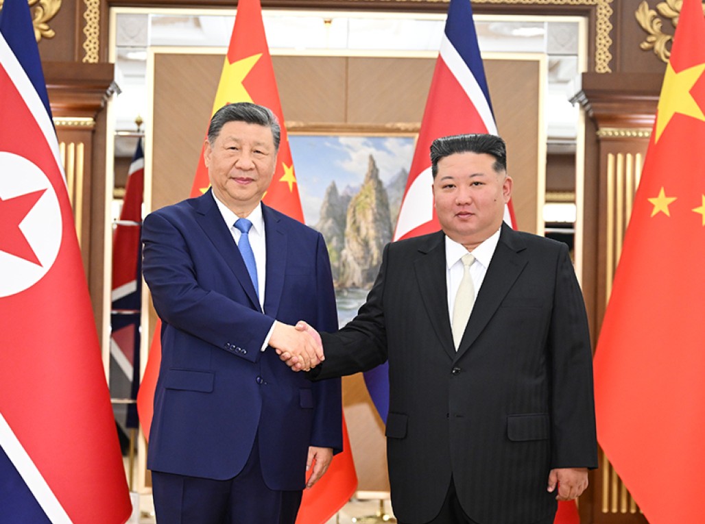 习近平同金正恩举行会谈